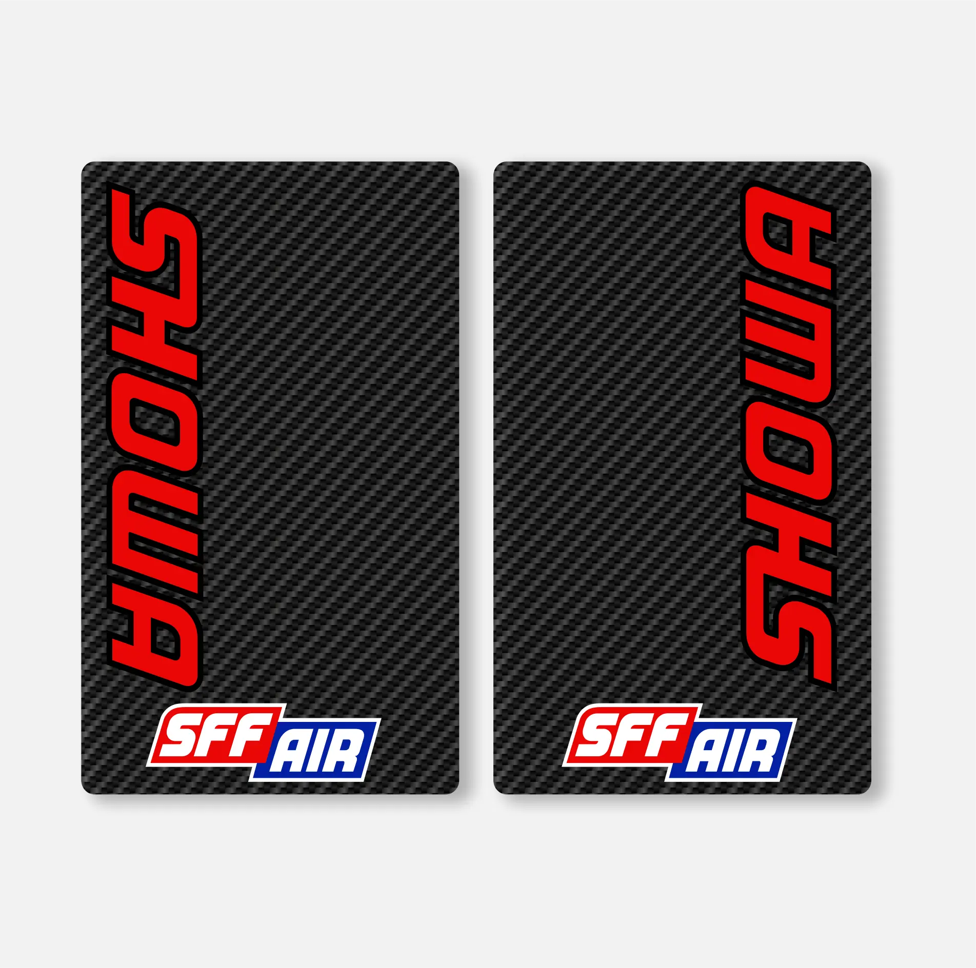 Two rectangular black fork decals with red and white 'SHOWA' branding and 'SFF AIR' text on a carbon fibre effect background.